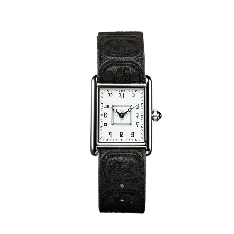 A rectangular analog watch with a silver-toned case, white dial, and black embossed leather strap on a plain white background.